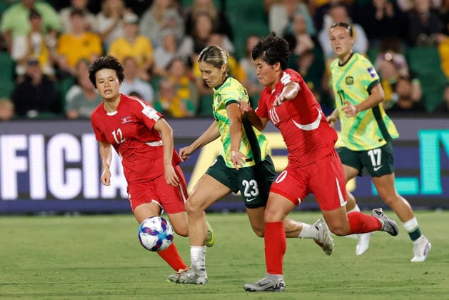 SOCCER ASIAN CUP MATILDAS DPR KOREA, Kyra Cooney-Cross of Australia under pressure fromHong Song-Ok and Ri Hak of North Korea during the AFC Women™s Asian Cup Quarter Final match between Australia and Democratic People s Republic of Korea (DPR) at HBF Park in Perth, Friday, March 13, 2026. ( NO ARCHIVING, EDITORIAL USE ONLY PERTH WESTERN AUSTRALIA AUSTRALIA  Copyright: xRICHARDxWAINWRIGHTx 20260313193070428557