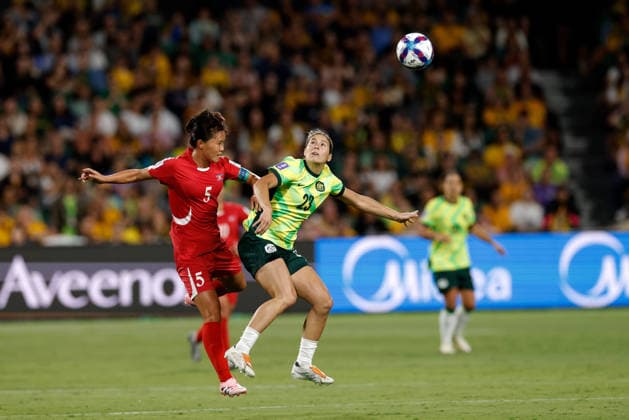 SOCCER ASIAN CUP MATILDAS DPR KOREA, Kyra Cooney-Cross of Australia and An Kuk-hyang of North Korea compete for the ball during the AFC Women™s Asian Cup Quarter Final match between Australia and Democratic People s Republic of Korea (DPR) at HBF Park in Perth, Friday, March 13, 2026. ( NO ARCHIVING, EDITORIAL USE ONLY PERTH WESTERN AUSTRALIA AUSTRALIA  Copyright: xRICHARDxWAINWRIGHTx 20260313129167477097