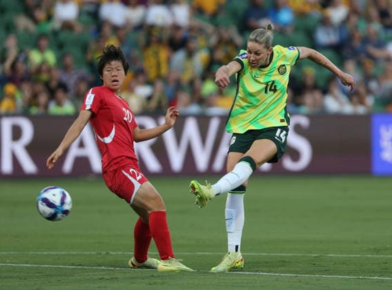 (260313) -- PERTH, March 13, 2026 -- Alanna Kennedy (R) of Australia scores the first goal during the quarterfinal of Women s Asian Cup between Australia and the Democratic People s Republic of Korea (DPRK) at Perth Rectangular Stadium in Perth, Australia, March 13, 2026. (Photo by Xinhua) (SP)AUSTRALIA-PERTH-FOOTBALL-WOMEN S ASIAN CUP-QUARTERFINALS-AUS VS PRK ZhouxDan 