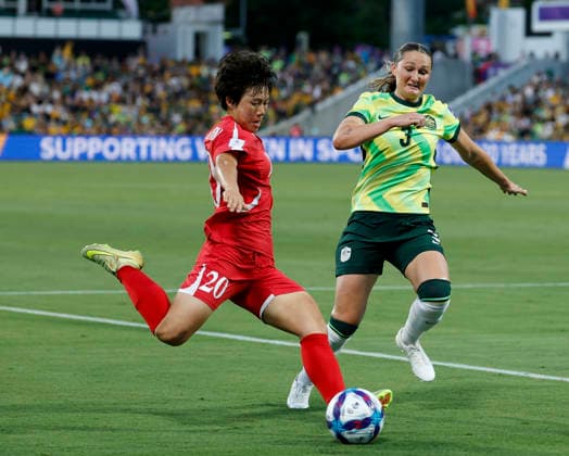 (260313) -- PERTH, March 13, 2026 -- Chae Un Yong of DPRK vies with Winonah Heatley of Australia during the quarterfinal of Women s Asian Cup between Australia and the Democratic People s Republic of Korea (DPRK) at Perth Rectangular Stadium in Perth, Australia, March 13, 2026. ) (SP)AUSTRALIA-PERTH-FOOTBALL-WOMEN S ASIAN CUP-QUARTERFINALS-AUS VS PRK MaxPing 