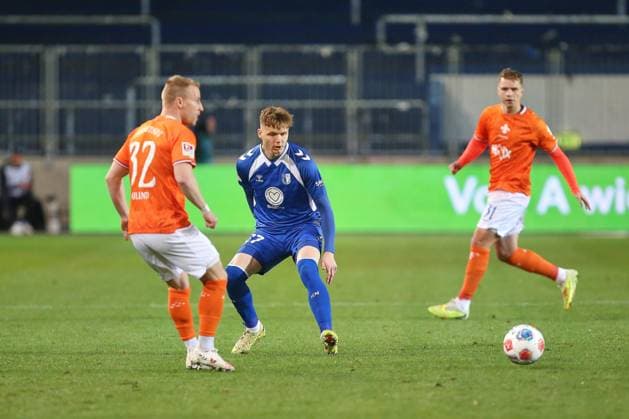 Magdeburg, Saxony-Anhalt, Germany, 13 03 2026 Avnet Arena 26 Matchday, Season 2025 26, 2 Soccer Bundesliga 1 FC Magdeburg Darmstadt 98 Fabian Holland 32, SV Darmstadt 98 and Philipp Hercher 27, 1 FC Magdeburg Copyright: xdtsxNachrichtenagenturx dts_110616