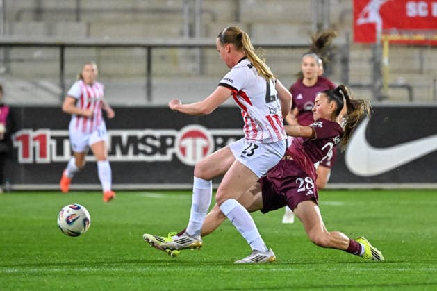 Luca Birkholz SC Freiburg, 23 , Maaelle Seguin 1 FC Nuernberg, 28 in duel, duel GER, SC Freiburg 1 FC Nuernberg, Womens Football, Google Pixel Womens Bundesliga, 20 Matchday, Season 2025 2026, 13 03 2026 DFB REGULATES PROHIBIT ANY USE OF PHOTOGRAPHS AS IMAGE SEQUENCES AND OR QUASI VIDEO GER, SC Freiburg 1 FC Nuernberg, Womens football, Google Pixel Womens Bundesliga, Matchday 20, Season 2025 2026, 13 03 2026 Freiburg Copyright: xEibner-Pressefoto ThomasxHessx EP_THS