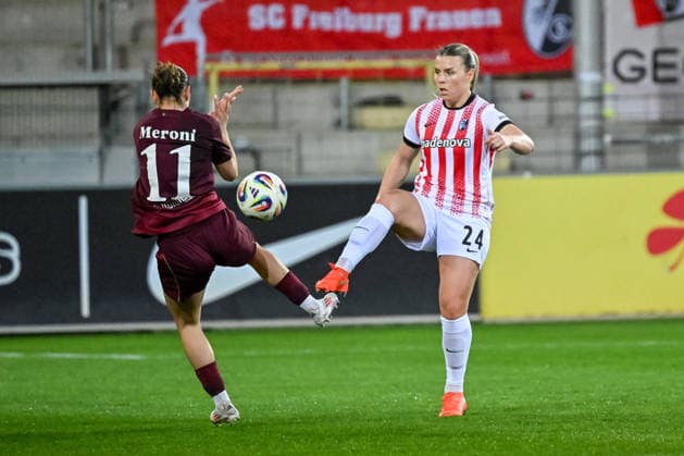 Lara Meroni 1 FC Nuernberg, 11 , Ingibjoerg Sigurdardottir SC Freiburg, 24 in duel GER, SC Freiburg 1 FC Nuernberg, Womens Football, Google Pixel Womens Bundesliga, Matchday 20, Season 2025 2026, 13 03 2026 DFB REGULATES PROHIBIT ANY USE OF PHOTOGRAPHS AS IMAGE SEQUENCES AND OR QUASI VIDEO GER, SC Freiburg 1 FC Nuernberg, Womens football, Google Pixel Womens Bundesliga, Matchday 20, Season 2025 2026, 13 03 2026 Freiburg Copyright: xEibner-Pressefoto ThomasxHessx EP_THS