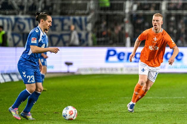 Soccer I Men I Season 2025 2026 I 2 Bundesliga I 26 Matchday I 1 FC Magdeburg SV Darmstadt 98 I 13 03 2026 Baris Atik 23, 1 FC Magdeburg plays the ball in front of Kai Klefisch 17, SV Darmstadt 98 Magdeburg Avnet Arena Heinz Krügel Platz 1 Sachsen Anhalt Germany Copyright: xLobeca InesxHähnelx