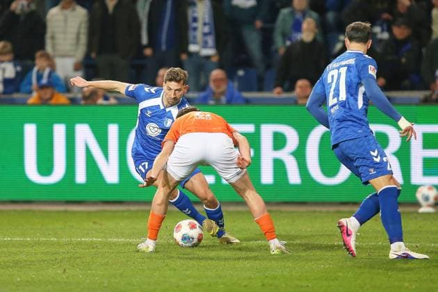 Magdeburg, Saxony-Anhalt, Germany, 13 03 2026 Avnet Arena 26 Matchday, Season 2025 26, 2 Soccer Bundesliga 1 FC Magdeburg Darmstadt 98 Alexander Nollenberger 17, 1 FC Magdeburg and Sergio López 2, SV Darmstadt 98 , Falko Michel 21, 1 FC Magdeburg looks on Copyright: xdtsxNachrichtenagenturx dts_110630