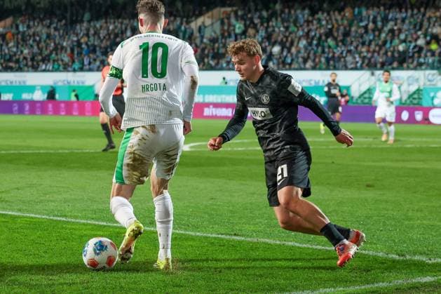 Branimir Hrgota 10 Spvgg Greuther Fuerth in duel with Lasse Guenther 21 SV 07 Elversberg , Spvgg Greuther Fuerth vs SV Elversberg Football, Men, 2 Bundesliga, Saison 2025 2026, Rueckrunde, 26 Spieltag, 13 03 2026 DFB regulations prohibit any use of photographs as image sequences and or quasi video Fuerth Bayern Germany Copyright: xkolbert-press MartinxAgüerax
