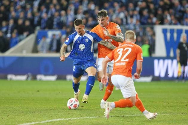 Magdeburg, Saxony-Anhalt, Germany, 13 03 2026 Avnet Arena 26 Matchday, Season 2025 26, 2 Soccer Bundesliga 1 FC Magdeburg Darmstadt 98 Mateusz Zukowski 22, 1 FC Magdeburg and Matej Maglica 5, SV Darmstadt 98 , next to Fabian Holland 32, SV Darmstadt 98 Copyright: xdtsxNachrichtenagenturx dts_110635