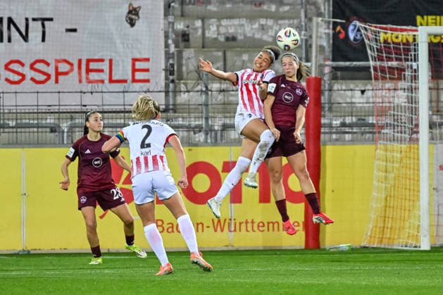 Nicole Ojukwu SC Freiburg, 06 , Laura Miller 1 FC Nuernberg, 09 in aerial duel for the ball GER, SC Freiburg 1 FC Nuernberg, Womens Soccer, Google Pixel Womens Bundesliga, 20 Matchday, Season 2025 2026, 13 03 2026 DFB REGULATES PROHIBIT ANY USE OF PHOTOGRAPHS AS IMAGE SEQUENCES AND OR QUASI VIDEO GER, SC Freiburg 1 FC Nuernberg, Womens football, Google Pixel Womens Bundesliga, Matchday 20, Season 2025 2026, 13 03 2026 Freiburg Copyright: xEibner-Pressefoto ThomasxHessx EP_THS