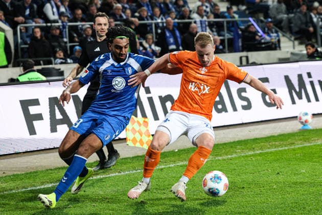 Fabian Holland SV Darmstadt 98,32 vs Rayan Ghrieb 1 FC Magdeburg,29 2 Soccer Bundesliga Season 2025 2026 1 FC Magdeburg vs SV Darmstadt 98 at the Avnet Arena in Magdeburg Action,Soccer,Man,Men,Germany,13 03 2026