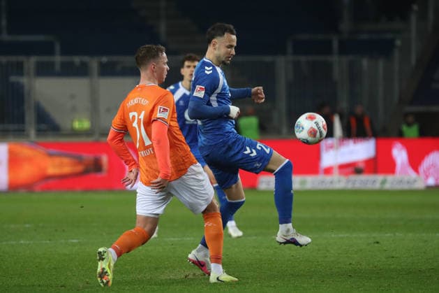 13 03 2026, xgox, Soccer 2 Bundesliga, 1 FC Magdeburg SV Darsmtadt 98 emspor, v l Niklas Schmidt Darmstadt, 31 , Falko Michel Magdeburg, 21 DFL DFB REGULATIONS PROHIBIT ANY USE OF PHOTOGRAPHS as IMAGE SEQUENCES and or QUASI VIDEO Magdeburg