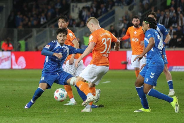 13 03 2026, xgox, Soccer 2 Bundesliga, 1 FC Magdeburg SV Darsmtadt 98 emspor, v l Laurin Ulrich Magdeburg, 8 , Fabian Holland Darmstadt, 32 DFL DFB REGULATIONS PROHIBIT ANY USE OF PHOTOGRAPHS as IMAGE SEQUENCES and or QUASI VIDEO Magdeburg