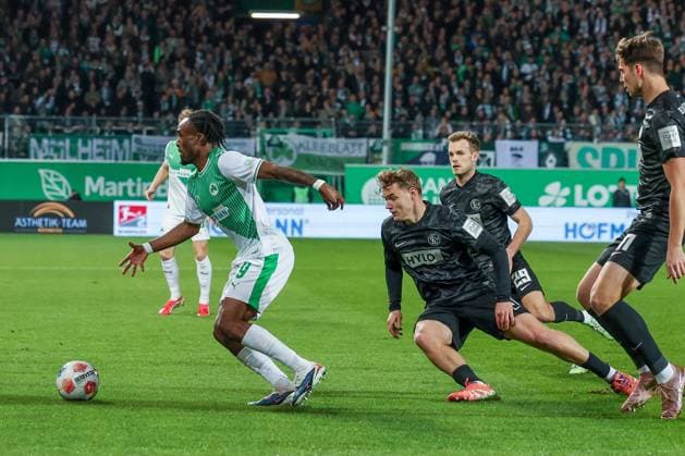 Noel Futkeu 9 Spvgg Greuther Fuerth in action against Lasse Guenther 21 SV 07 Elversberg , Spvgg Greuther Fuerth vs SV Elversberg Football, Men, 2 Bundesliga, Saison 2025 2026, Rueckrunde, 26 Spieltag, 13 03 2026 DFB regulations prohibit any use of photographs as image sequences and or quasi video Fuerth Bayern Germany Copyright: xkolbert-press MartinxAgüerax