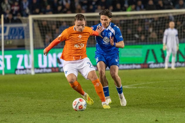 Germany, 2 Bundesliga, Season 2025 2026, Matchday 26, Avnet Arena, 1 FC Magdeburg vs SV Darmstadt 98, Schmidt Niklas SV Darmstadt 98, 31 in duel against Stalmach Dariusz 1 FC Magdeburg, 6 Copyright: xMichellexLukax