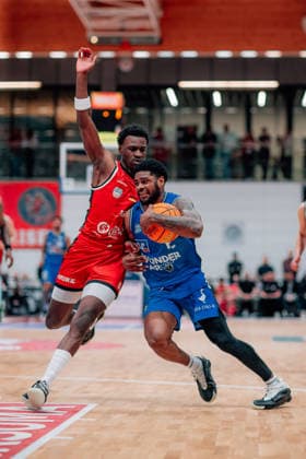 BB 2BL SBB Baskets HAKRO Merlins Crailsheim Xavier Trent Johnson HAKRO Merlins Crailsheim , Joshua Bonga SBB Baskets during the 2025 2026 season in the 2 Barmer Basketball Bundesliga Pro A on matchday 26 between SBB Baskets and HAKRO Merlins Crailsheim at Wolfgang Lakenmacher Halle on March 13, 2026 in Magdeburg, Sachsen Anhalt, Germany