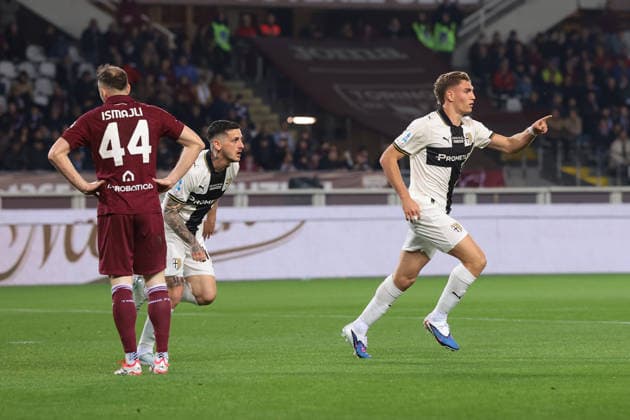 Turin, Italy, 13th March 2026. Mateo Pellegrino of Parma Calcio celebrates with team mates after scoring to level the game at 1-1 during the Torino vs Parma Serie A match at Stadio Grande Torino, Turin. Picture credit should read: Jonathan Moscrop Sportimage EDITORIAL USE ONLY. No use with unauthorised audio, video, data, fixture lists, club league logos or live services. Online in-match use limited to 120 images, no video emulation. No use in betting, games or single club league player publications. SPI_011_JM_TORO_PARMA SPI-4613-0011