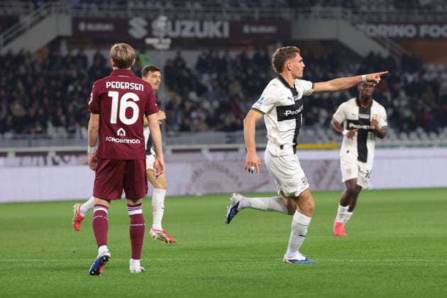 Turin, Italy, 13th March 2026. Mateo Pellegrino of Parma Calcio celebrates with team mates after scoring to level the game at 1-1 during the Torino vs Parma Serie A match at Stadio Grande Torino, Turin. Picture credit should read: Jonathan Moscrop Sportimage EDITORIAL USE ONLY. No use with unauthorised audio, video, data, fixture lists, club league logos or live services. Online in-match use limited to 120 images, no video emulation. No use in betting, games or single club league player publications. SPI_012_JM_TORO_PARMA SPI-4613-0012
