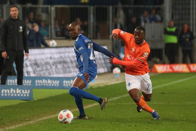 13 03 2026, xgox, Soccer 2 Bundesliga, 1 FC Magdeburg SV Darsmtadt 98 emspor, v l Silas Gnaka Magdeburg, 25 , Merveille Papela Darmstadt, 21 duel, duel, fight, tackle DFL DFB REGULATIONS PROHIBIT ANY USE OF PHOTOGRAPHS as IMAGE SEQUENCES and or QUASI VIDEO Magdeburg