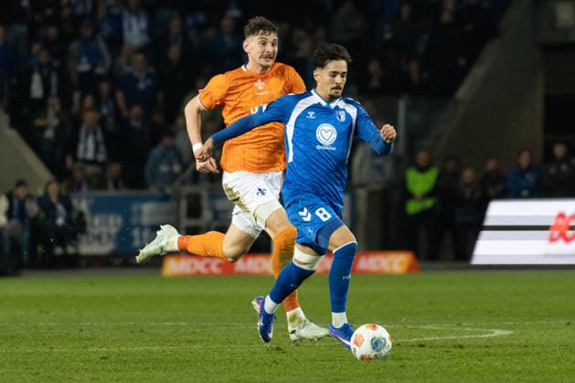 Germany, 2 Bundesliga, Season 2025 2026, Matchday 26, Avnet Arena, 1 FC Magdeburg vs SV Darmstadt 98, Maglica Matej SV Darmstadt 98, 5 in duel against Ulrich Laurin 1 FC Magdeburg, 8 Copyright: xMichellexLukax