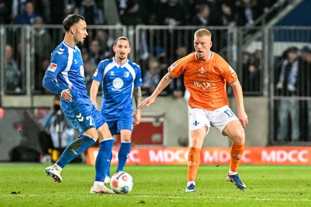 Soccer I Men I Season 2025 2026 I 2 Bundesliga I 26 Matchday I 1 FC Magdeburg SV Darmstadt 98 I 13 03 2026 Duel Falko Michel 21, 1 FC Magdeburg and Kai Klefisch 17, SV Darmstadt 98 Magdeburg Avnet Arena Heinz Krügel Platz 1 Sachsen Anhalt Germany Copyright: xLobeca InesxHähnelx