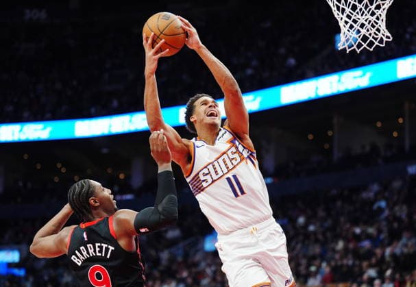 March 13, 2026, Toronto, On, Canada: Phoenix Suns Oso Ighodaro (11) is fouled by Toronto Raptors RJ Barrett (9) during second half NBA, Basketball Herren, USA basketball action in Toronto on Friday, March 13, 2026. Canada News - March 13, 2026  - ZUMAc35_ 20260313_zaf_c35_132 Copyright: xFrankxGunnx