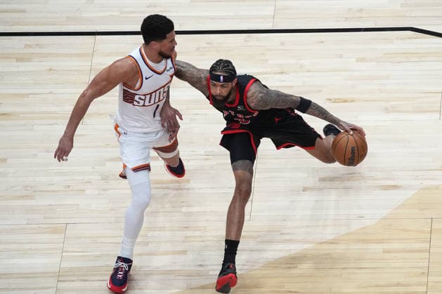 Phoenix Suns v Toronto Raptors - NBA, Basketball Herren, USA TORONTO, CANADA - MARCH 13 : Brandon Ingram (3) of Toronto Raptors in action against Devin Booker (1) of Phoenix Suns during the NBA basketball game between Phoenix Suns and Toronto Raptors at the Scotiabank Arena on March 13, 2026 in Toronto, Ontario, Canada. Mert Alper Dervis Anadolu Toronto Canada. Editorial use only. Please get in touch for any other usage.  Copyright: x2026xAnadoluxMertxAlperxDervisx