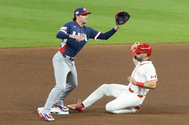 Edouard Julien (R) of Canada slides past Brice Turang of the United States during a World Baseball Classic game between the United States and Canada at Daikin Park in Houston, Texas, United States, 13 March 2026. World Baseball Classic: United States - Canada !ACHTUNG: NUR REDAKTIONELLE NUTZUNG!  Copyright: xCarlosxRamirezx AME3906 20260314-55019692312_1