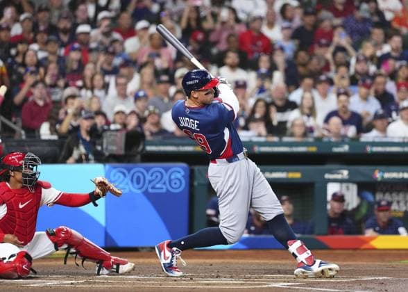 World Baseball Classic: U.S. vs. Canada Aaron Judge of the United States hits a double in the first inning of a World Baseball Classic quarterfinal game against Canada at Daikin Park in Houston, Texas, on March 13, 2026.  A14AA0005381902P