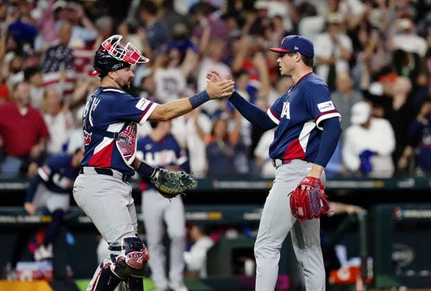 World Baseball Classic: U.S. vs. Canada United States closer Mason Miller (R) and catcher Cal Raleigh high-five after beating Canada in a World Baseball Classic quarterfinal game at Daikin Park in Houston, Texas, on March 13, 2026.  A14AA0005381918P