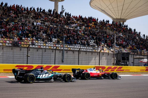 Shanghai Formula 1 Chinese Grand Prix - Sprint Race GEORGE RUSSELL (GBR) of Mercedes-AMG PETRONAS Formula One Team 63 racing LEWIS HAMILTON (GBR) of Scuderia Ferrari HP 44 on Saturday during the 2026 Formula 1 Heineken Chinese Grand Prix at the Shanghai Audi International Circuit on March 14, 2026. Photo by Antoine Lapeyre ABACAPRESS.COM Shanghai China  Copyright: xLapeyrexAntoine ABACAx