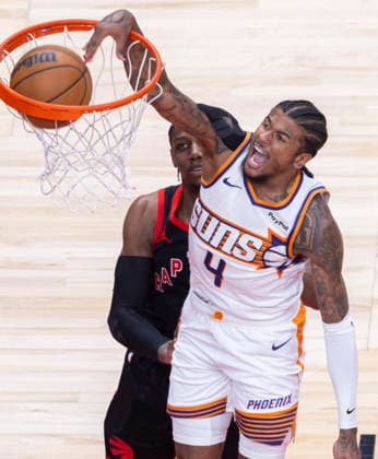 (260314) -- TORONTO, March 14, 2026 -- Jalen Green (R) of Phoenix Suns dunks during the 2025-2026 NBA, Basketball Herren, USA regular season game between Toronto Raptors and Phoenix Suns in Toronto, Canada, on March 13, 2026. (Photo by Xinhua) (SP)CANADA-TORONTO-BASKETBALL-NBA-SUNS VS RAPTORS ZouxZheng 