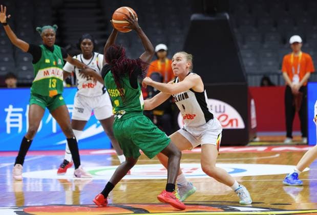 Mali s Foune Sissoko and Belgium s Elise Ramette fight for the ball during a basket game between Belgium s national team, Nationalteam Belgian Cats and Mali, in Wuhan, China, on Saturday 14 March 2026, the third game (out of 5) of the qualifications phase for the World Cup Basket tournament. NIKOLAxKRSTIC  x167426592x