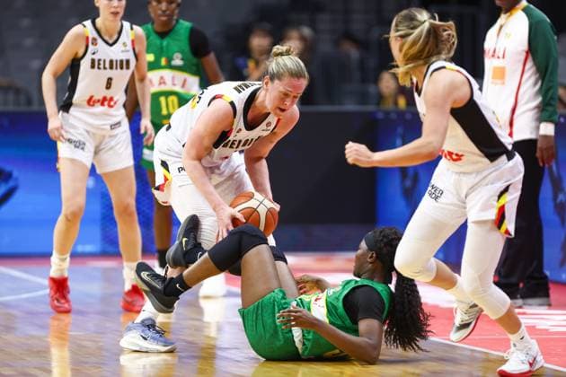 Belgium s Emma Meesseman and Mali s Djeneba N Daiye fight for the ball during a basket game between Belgium s national team, Nationalteam Belgian Cats and Mali, in Wuhan, China, on Saturday 14 March 2026, the third game (out of 5) of the qualifications phase for the World Cup Basket tournament. NIKOLAxKRSTIC  x167428317x