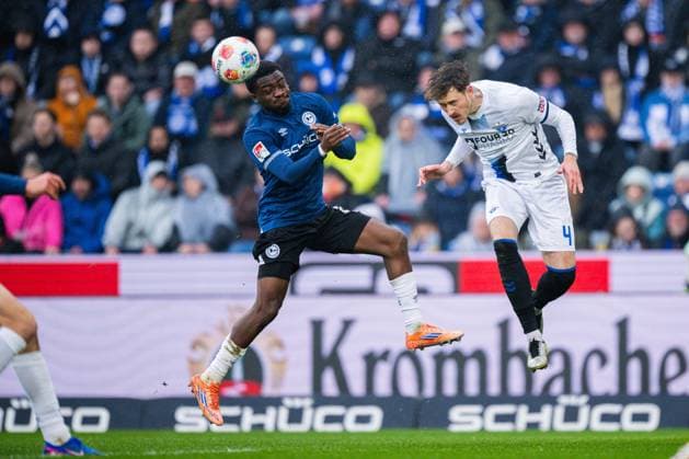 14 03 2026 Soccer, 2025 2026, 2 Bundesliga, Matchday 26, DSC Arminia Bielefeld SC Paderborn 07 L R Tim Handwerker Bielefeld , Calvin Brackelmann Paderborn DFL REGULATIONS PROHIBIT ANY USE OF PHOTOGRAPHS AS IMAGE SEQUENCES AND OR QUASI VIDEO