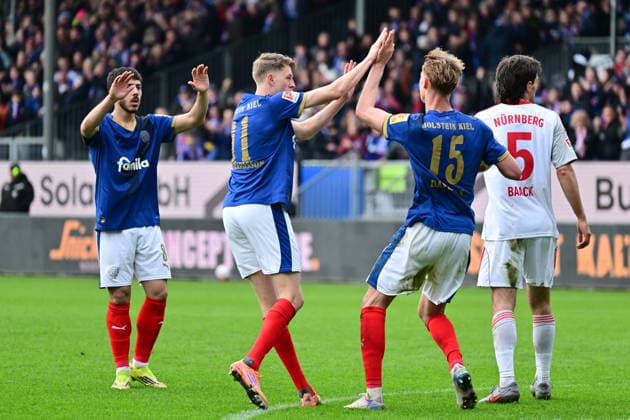 14 03 2026, Soccer, Men, 2 BL Bundesliga , Season 2025 2026, Holstein Kiel 1 FC Nürnberg, Matchday 26 Kasper Davidsen scores the 2 2 equalizer for Holstein Kiel and cheers Kiel, Holstein Stadion Holstein Stadion Schleswig Holstein Germany
