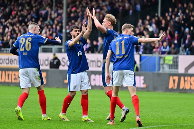 14 03 2026, Soccer, Men, 2 BL Bundesliga , Season 2025 2026, Holstein Kiel 1 FC Nürnberg, Matchday 26 Kasper Davidsen scores the 2 2 equalizer for Holstein Kiel and cheers Kiel, Holstein Stadion Holstein Stadion Schleswig Holstein Germany