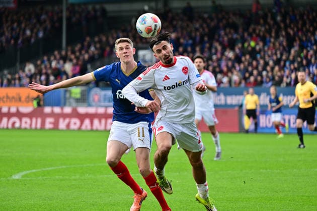 14 03 2026, Football, Men, 2 BL Bundesliga , Season 2025 2026, Holstein Kiel 1 FC Nürnberg, Matchday 26 Alexander Bernhardsson v Berkay Yilmaz Kiel, Holstein Stadion Schleswig Holstein Germany