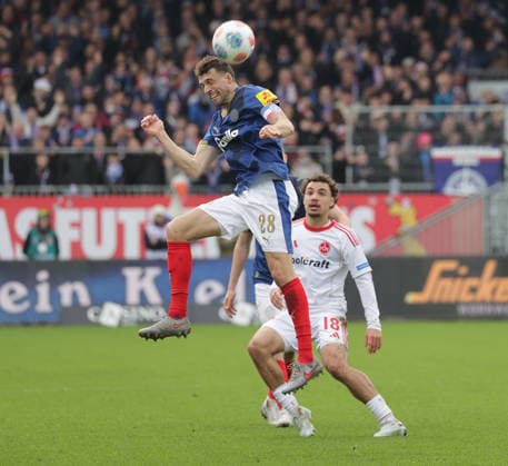 Jonas Meffert Holstein Kiel , Rafael Lubach 1 FC Nuernberg Football, Men, Season 2025 2026, 2 BL, Holstein Stadion, Holstein Kiel vs 1 FC Nuernberg DFL REGULATIONS PROHIBIT ANY USE OF PHOTOGRAPHS AS IMAGE SEQUENCES AND OR QUASI VIDEO