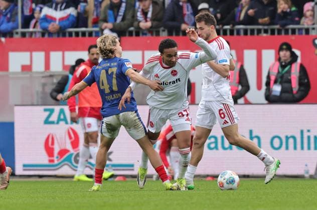 14 03 2026 Soccer Season 2025 2026 2 Soccer Bundesliga 26 Matchday Holstein Kiel KSV Kieler Sportvereinigung Holstein von 1900 Störche 1 FC Nürnberg FCN Club Sportfoto Zink DaMa xdaxmax DFL regulations prohibit any use of photographs as image sequences and or quasi video only for editorial use John Tolkin 47, Holstein Kiel Noah Maboulou 37, 1 FC Nürnberg FCN
