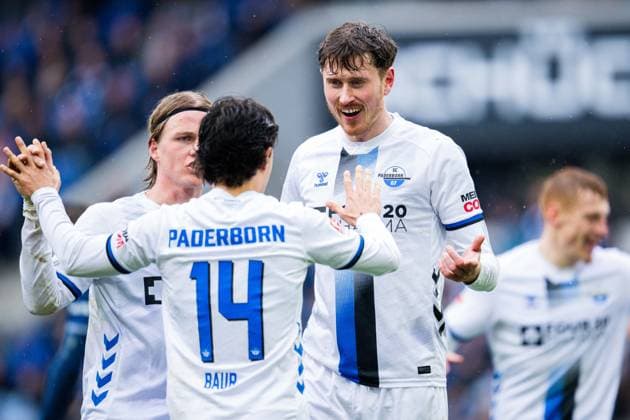 14 03 2026 Soccer, 2025 2026, 2 Bundesliga, Matchday 26, DSC Arminia Bielefeld SC Paderborn 07 R Calvin Brackelmann Paderborn cheers after his supposed goal to 1 1 with L M Felix Götze Paderborn , Mika Baur Paderborn DFL REGULATIONS PROHIBIT ANY USE OF PHOTOGRAPHS AS IMAGE SEQUENCES AND OR QUASI VIDEO
