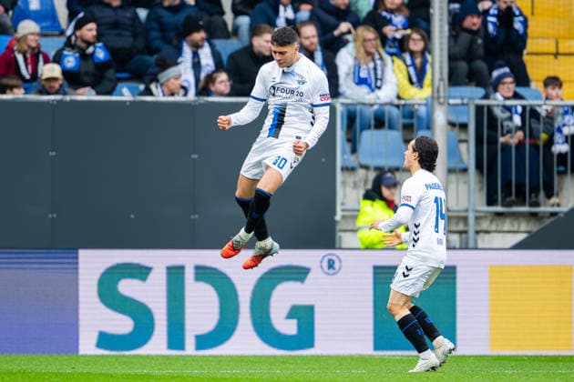 14 03 2026 Soccer, 2025 2026, 2 Bundesliga, Matchday 26, DSC Arminia Bielefeld SC Paderborn 07 L R Stefano Marino Paderborn celebrates after his goal to 1 1 with Mika Baur Paderborn DFL REGULATIONS PROHIBIT ANY USE OF PHOTOGRAPHS AS IMAGE SEQUENCES AND OR QUASI VIDEO