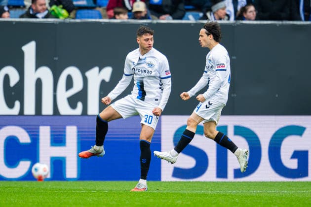14 03 2026 Soccer, 2025 2026, 2 Bundesliga, Matchday 26, DSC Arminia Bielefeld SC Paderborn 07 L R Stefano Marino Paderborn celebrates after his goal to 1 1 with Mika Baur Paderborn DFL REGULATIONS PROHIBIT ANY USE OF PHOTOGRAPHS AS IMAGE SEQUENCES AND OR QUASI VIDEO