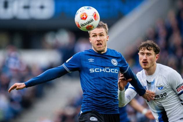 14 03 2026 Soccer, 2025 2026, 2 Bundesliga, Matchday 26, DSC Arminia Bielefeld SC Paderborn 07 L R Joel Grodowski Bielefeld , Calvin Brackelmann Paderborn DFL REGULATIONS PROHIBIT ANY USE OF PHOTOGRAPHS AS IMAGE SEQUENCES AND OR QUASI VIDEO