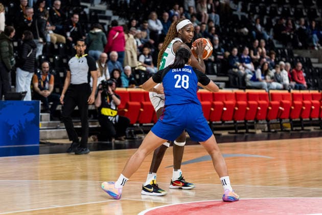LYON-VILLEURBANNE, FRANCE - MARCH 14: Victoria Macaulay (Nigeria, 25) controls the ball against Kacey Dela Rosa (Philippines, 28) during the FIBA Women™s World Cup Qualifying Tournament match between Nigeria (NGR) vs. Philippines (PHI) at Astroballe on matchday 3 of the FIBA Women™s World Cup Qualifying Tournament on March 14, 2026 in Lyon-Villeurbanne, France. France Copyright: xSteffiexWunderlx