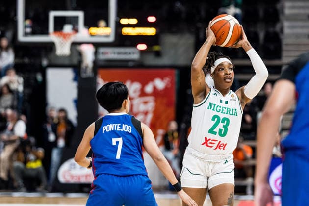LYON-VILLEURBANNE, FRANCE - MARCH 14: Ezinne Kalu (Nigeria, 23) controls the ball against Janine Pontejos (Philippines, 7) during the FIBA Women™s World Cup Qualifying Tournament match between Nigeria (NGR) vs. Philippines (PHI) at Astroballe on matchday 3 of the FIBA Women™s World Cup Qualifying Tournament on March 14, 2026 in Lyon-Villeurbanne, France. France Copyright: xSteffiexWunderlx