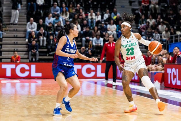 LYON-VILLEURBANNE, FRANCE - MARCH 14: Ezinne Kalu (Nigeria, 23) controls the ball against Stefanie Berberabe (Philippines, 11) during the FIBA Women™s World Cup Qualifying Tournament match between Nigeria (NGR) vs. Philippines (PHI) at Astroballe on matchday 3 of the FIBA Women™s World Cup Qualifying Tournament on March 14, 2026 in Lyon-Villeurbanne, France. France Copyright: xSteffiexWunderlx