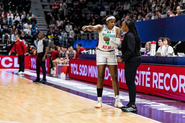 LYON-VILLEURBANNE, FRANCE - MARCH 14: Rena Wakama (Head Coach Nigeria) coaches Elizabeth Balogun (Nigeria, 4) during the FIBA Women™s World Cup Qualifying Tournament match between Nigeria (NGR) vs. Philippines (PHI) at Astroballe on matchday 3 of the FIBA Women™s World Cup Qualifying Tournament on March 14, 2026 in Lyon-Villeurbanne, France. France Copyright: xSteffiexWunderlx