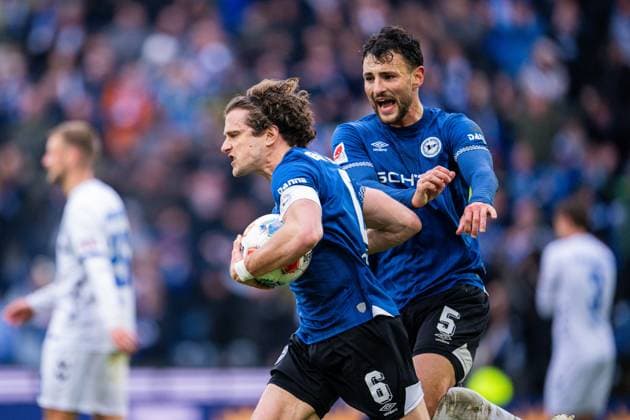 14 03 2026 Soccer, 2025 2026, 2 Bundesliga, Matchday 26, DSC Arminia Bielefeld SC Paderborn 07 L R Mael Corboz Bielefeld celebrates after his goal to 2 2 with Maximilian Bauer Bielefeld DFL REGULATIONS PROHIBIT ANY USE OF PHOTOGRAPHS AS IMAGE SEQUENCES AND OR QUASI VIDEO