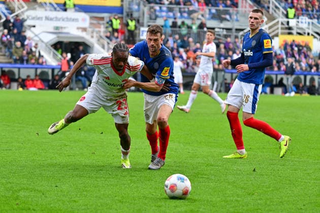 14 03 2026, Soccer, Men, 2 BL Bundesliga , Season 2025 2026, Holstein Kiel 1 FC Nürnberg, Matchday 26 Jonas Meffert vs Mohamed Ali Zoma Kiel, Holstein Stadion Holstein Stadion Schleswig Holstein Germany