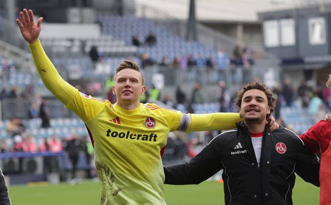 Goalkeeper Jan Reichert 1 FC Nuernberg is happy Football, Men, Season 2025 2026, 2 BL, Holstein Stadion, Holstein Kiel vs 1 FC Nuernberg, 2 3 DFL REGULATIONS PROHIBIT ANY USE OF PHOTOGRAPHS AS IMAGE SEQUENCES AND OR QUASI VIDEO