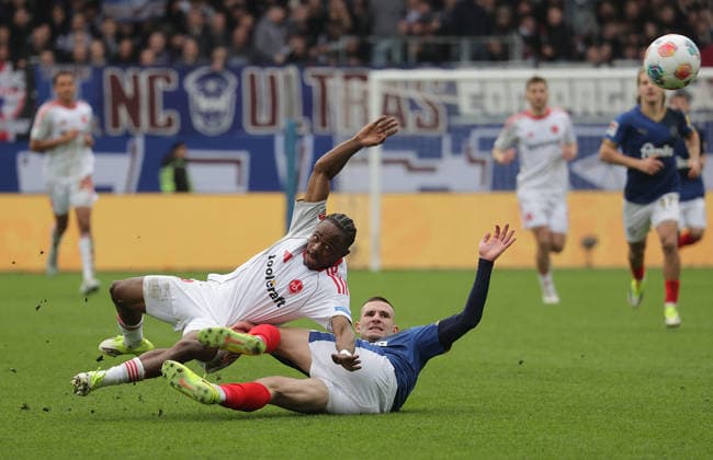 Duel between Mohamed Ali Zoma 1 FC Nuernberg and David Zec Holstein Kiel Football, Men, Season 2025 2026, 2 BL, Holstein Stadion, Holstein Kiel vs 1 FC Nuernberg, 2 3 DFL REGULATIONS PROHIBIT ANY USE OF PHOTOGRAPHS AS IMAGE SEQUENCES AND OR QUASI VIDEO